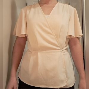 Topshop cream peplum blouse short sleeved size 6